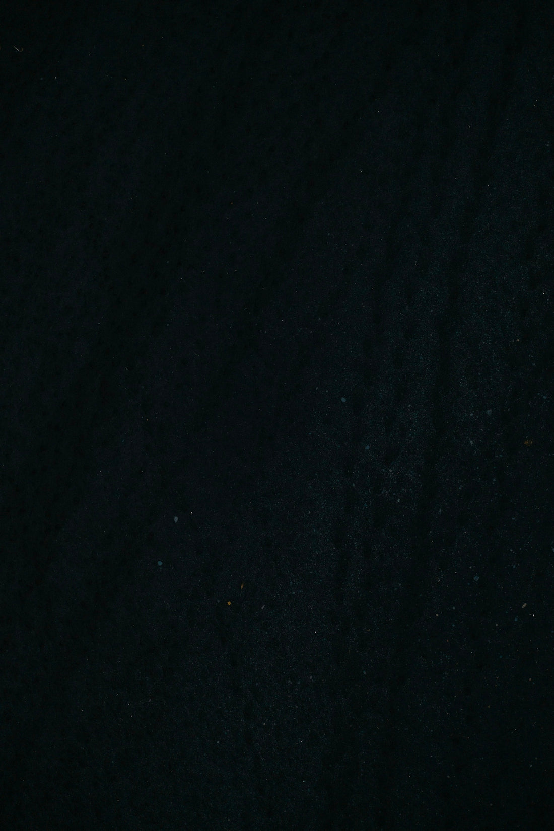 a black background with small white dots