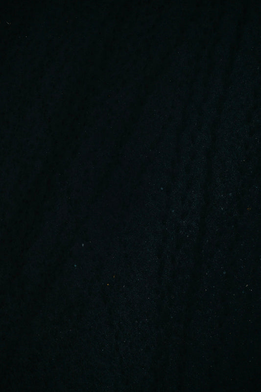 a black background with small white dots